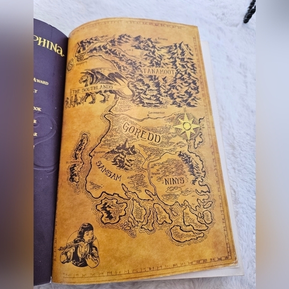 Seraphina Rachel Hartman  Can one girl unite two worlds? Kids Toy Book - Picture 9 of 12